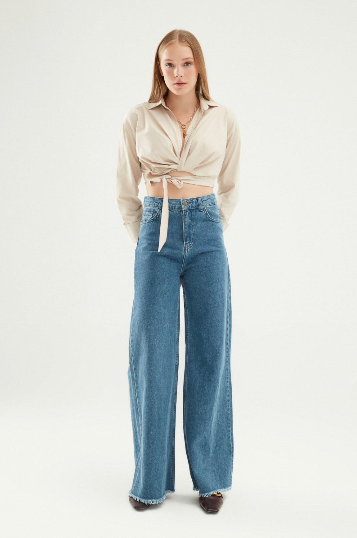 Light Blue Raw Hem Flared Jeans